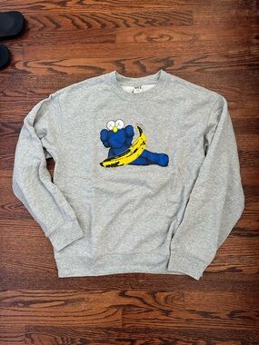 Uniqlo Gray Crewneck Sweatshirt with Blue Character and Yellow Banana Graphic